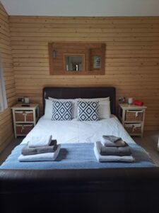 King Bedroom @ Honeysuckle Lodge Flowery Dell Lodges